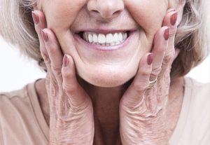 woman wearing a denture